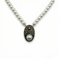 Sterling silver pendant with pearls