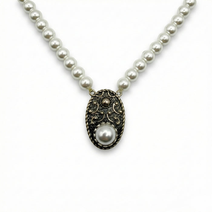Sterling silver pendant with pearls