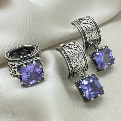 Sterling Silver set with purple stone